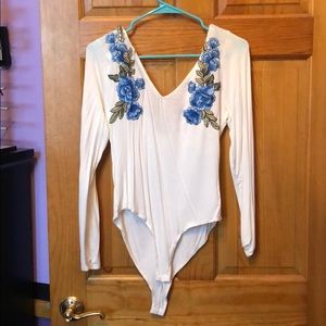 Charlotte Russe long sleeve bodysuit never worn
